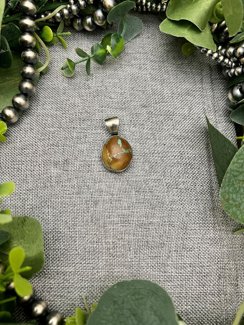 Royston Boulder Turquoise Stamped Bezel Pendants