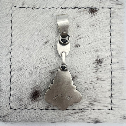 Back of the pendant stamped Betty Tom, the artist's hallmark