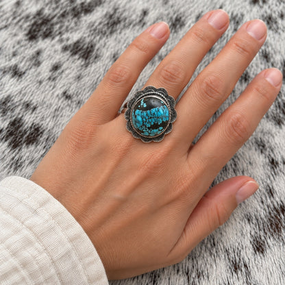 Blue Moon Turquoise Adjustable Ring worn around a finger; approximate scale